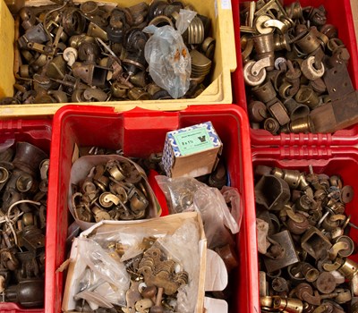 Lot 287 - Five boxes of brass furniture castors and a collection of dining table legs