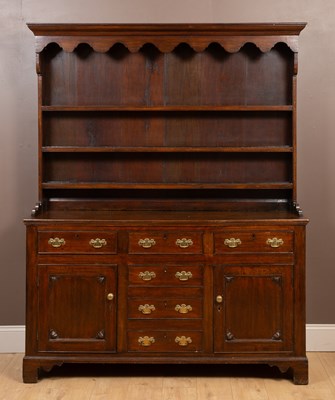 Lot 179 - A George III style oak dresser