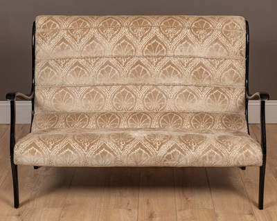 Lot 105 - A cream upholstered sofa