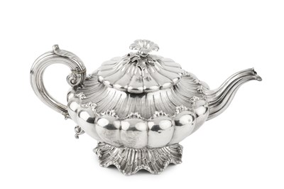 Lot 817 - A William IV silver teapot, of lobed and...