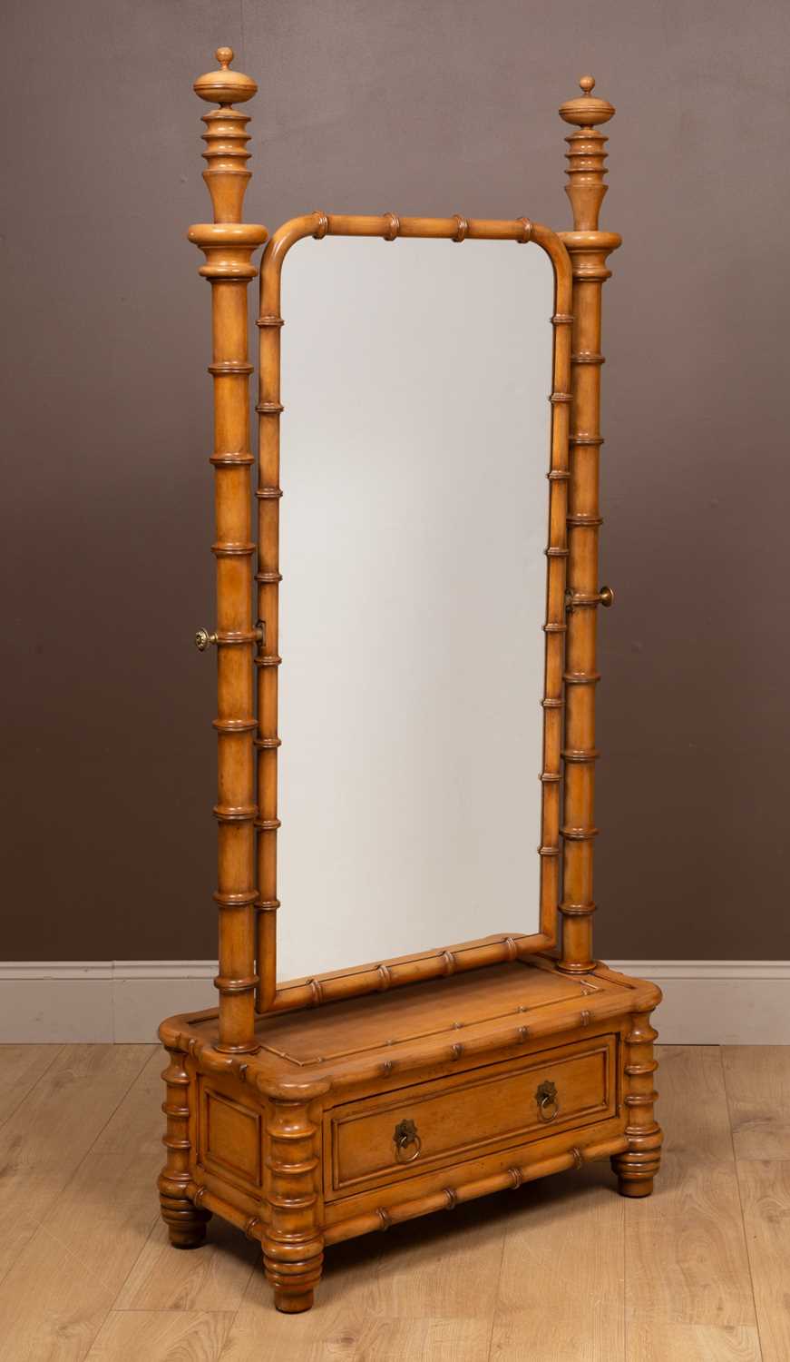 Lot 548 - A Regency style faux bamboo cheval mirror