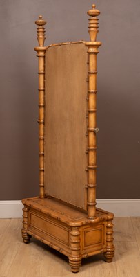 Lot 548 - A Regency style faux bamboo cheval mirror