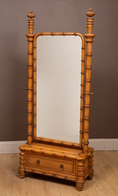 Lot 235 - A Regency style faux bamboo cheval mirror