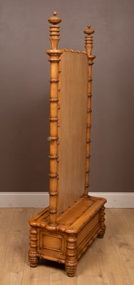 Lot 235 - A Regency style faux bamboo cheval mirror