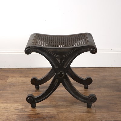 Lot 26 - Mahogany bergere stool in the form of an 'x',...