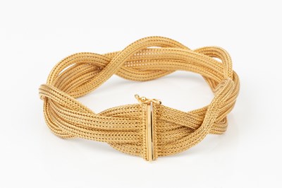 Lot 113 - An Italian 18ct gold bracelet, of entwined...