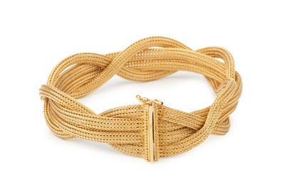 Lot 113 - An Italian 18ct gold bracelet, of entwined...
