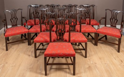 Lot 409 - A set of 12 mahogany dining chairs