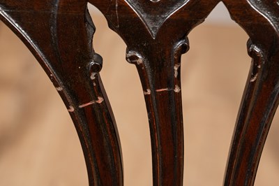 Lot 409 - A set of 12 mahogany dining chairs