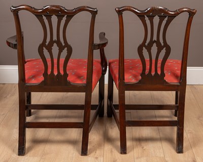 Lot 409 - A set of 12 mahogany dining chairs