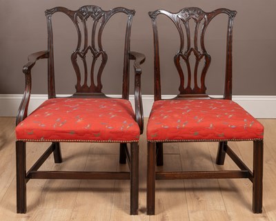 Lot 409 - A set of 12 mahogany dining chairs