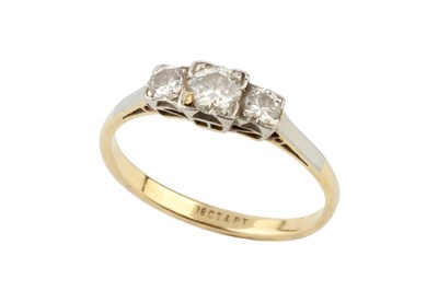 Lot 7 - A diamond three stone ring, the graduated...