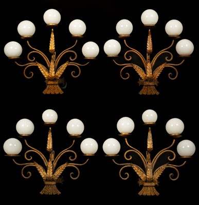 Lot 474 - A set of four five-branch gilt metal wall lights