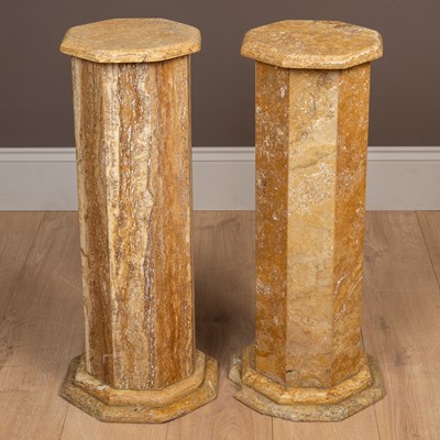 Lot 1242 - A pair of travertine plinths