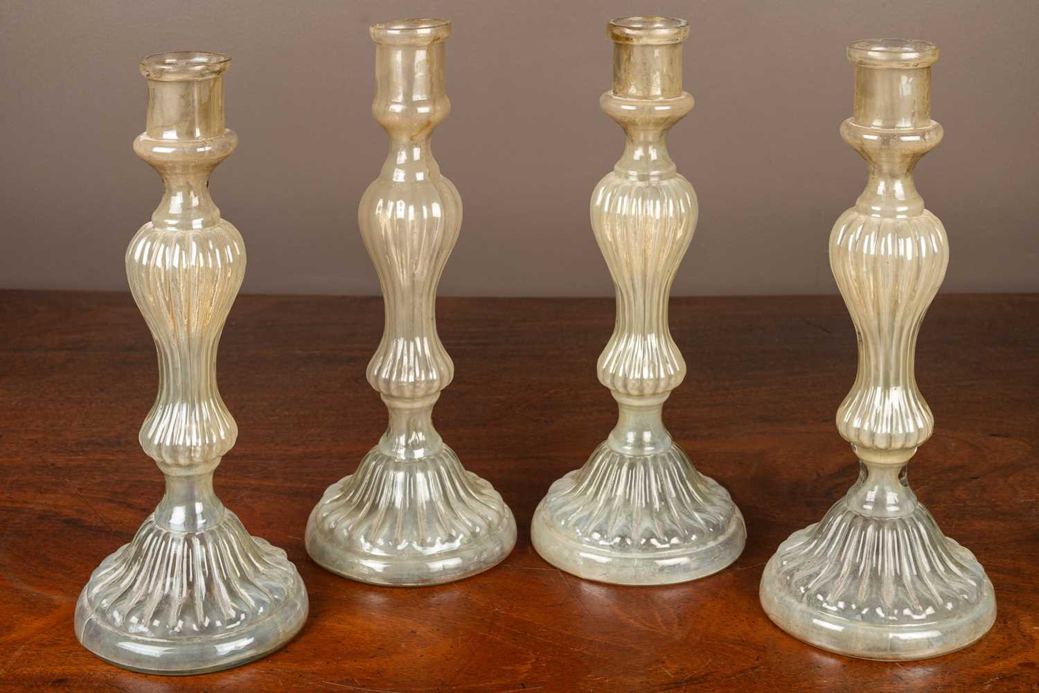 Lot 537 - Four opalescent glass candlesticks