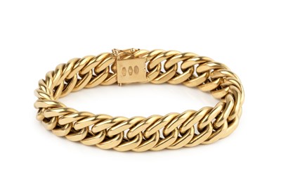 Lot 123 - An 18ct gold hollow curb link bracelet, the...