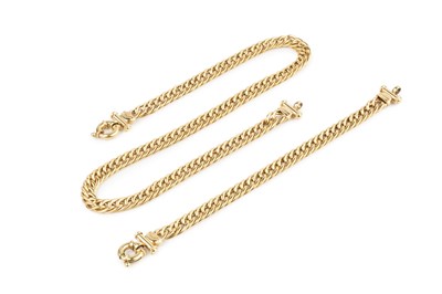 Lot 124 - A 9ct gold hollow curb link necklace and...