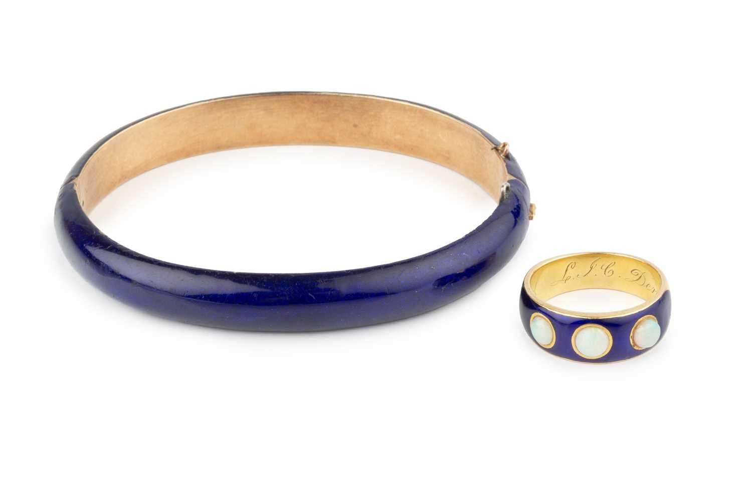 Lot 128 - A mid Victorian gold, opal and enamel memorial...