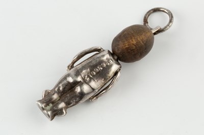 Lot 595 - A WWI silver 'Fumsup' mascot doll, with 'touch...