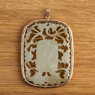 Lot 243 - Oval jade carved pendant Chinese, 19th Century...