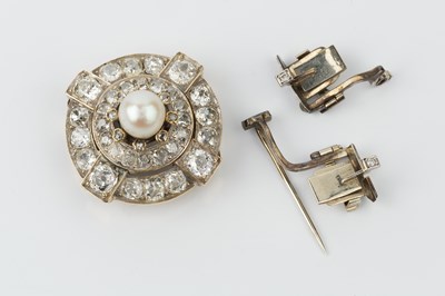 Lot 140 - A cultured pearl three strand necklace with...