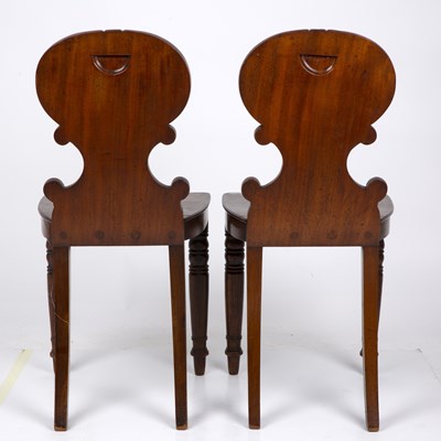 Lot 43 - A pair of early Victorian mahogany hall chairs...