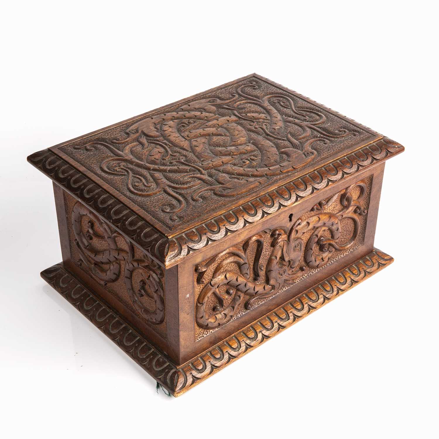 Lot 316 - A late 19th century carved oak box with carved...