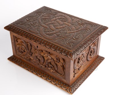 Lot 316 - A late 19th century carved oak box with carved...