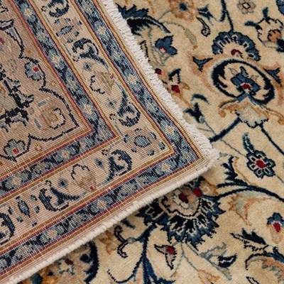 Lot 525 - A modern Tabriz rug