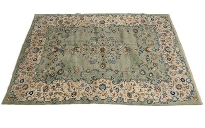 Lot 387 - A modern machine-woven Kashan carpet