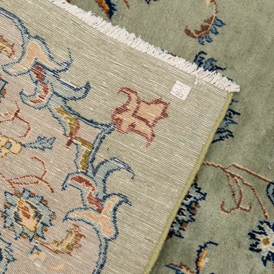 Lot 387 - A modern machine-woven Kashan carpet