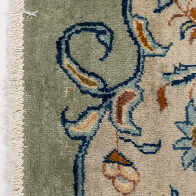 Lot 387 - A modern machine-woven Kashan carpet