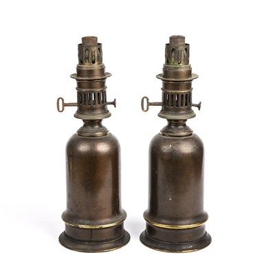 Lot 318 - A pair of patinated bronze Victorian oil lamps...