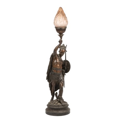 Lot 319 - An antique patinated spelter lamp in the form...