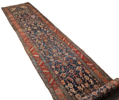 Lot 330 - An antique Persian Heriz country house runner...