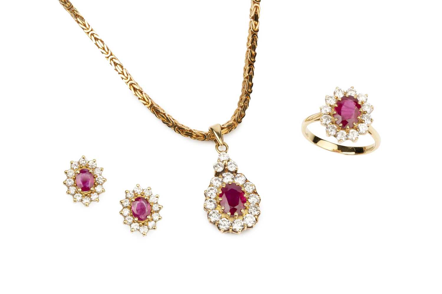 Lot 144 - A suite of ruby and diamond jewellery,...
