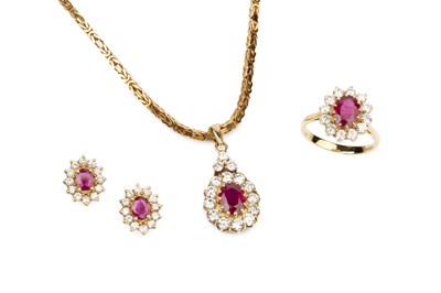 Lot 144 - A suite of ruby and diamond jewellery,...
