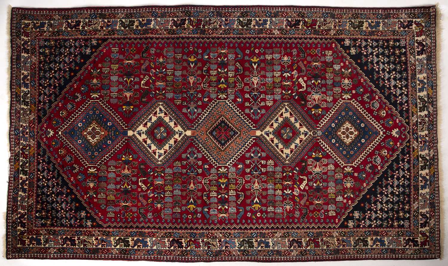 Lot 380 - A modern Isfahan red ground rug with five...