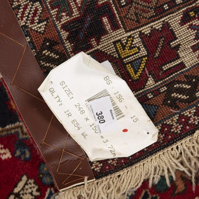 Lot 380 - A modern Isfahan red ground rug with five...