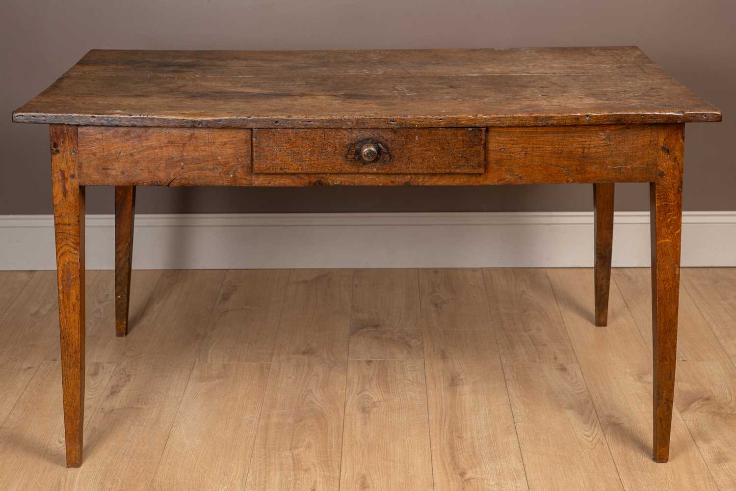 Lot 1045 - An antique oak farmhouse kitchen table