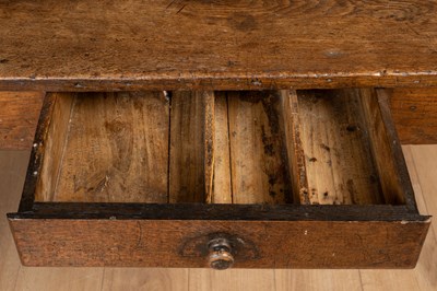 Lot 1045 - An antique oak farmhouse kitchen table