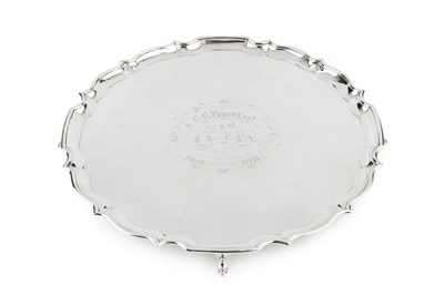 Lot 841 - An Edwardian silver salver, with shaped border...