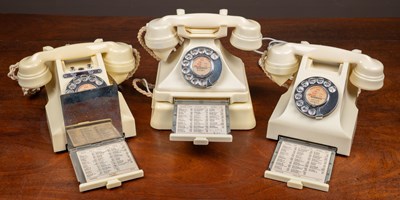 Lot 91 - Three cream Bakelite telephones