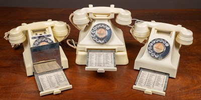 Lot 91 - Three cream Bakelite telephones