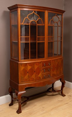 Lot 346 - An Edwardian bow-fronted and crossbanded display cabinet