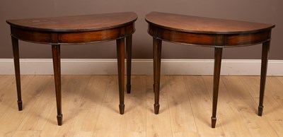 Lot 345 - A pair of George III style 'D' end tables