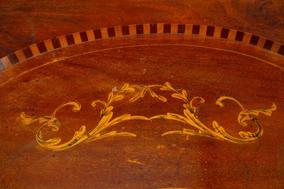 Lot 75 - An Edwardian kidney-shaped mahogany and inlaid tray