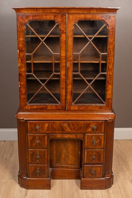 Lot 270 - A walnut astragal glazed bookcase