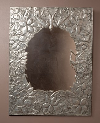Lot 170 - A decorative early to mid 20th century pewter framed wall mirror