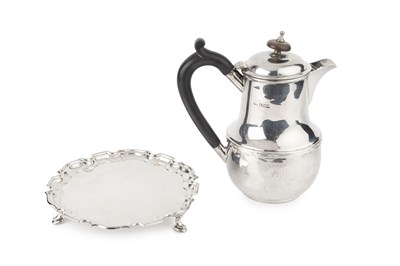 Lot 847 - A George V silver hot milk pot, of baluster...